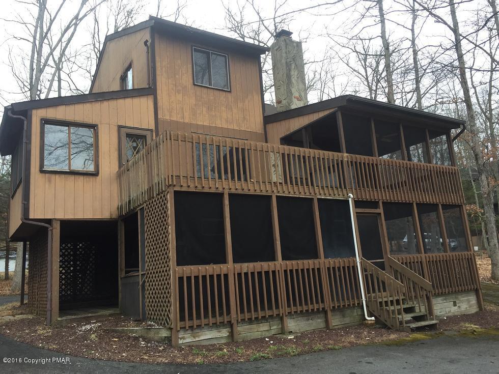 1231 Salisbury Road Bushkill, PA 18324 - Photo 3 of 16 a front view of a house with parking