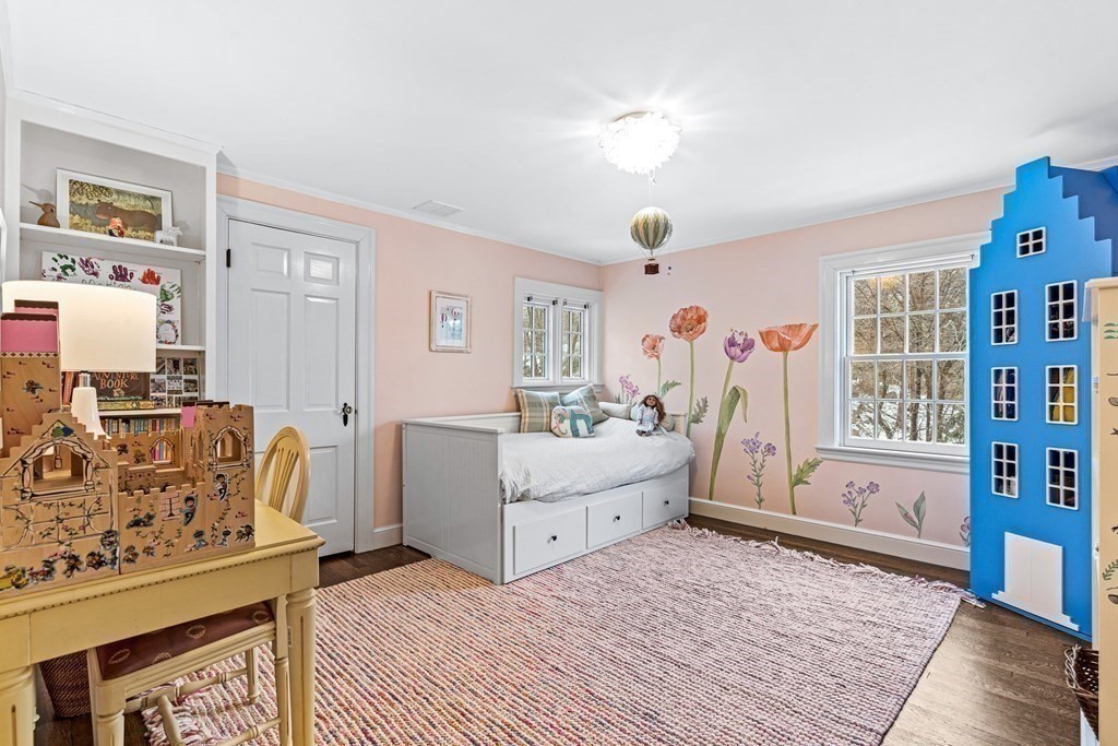 35 Sawyer Road Wellesley, MA 02481 - Photo 20 of 27 a spacious bedroom with a bed and a couch