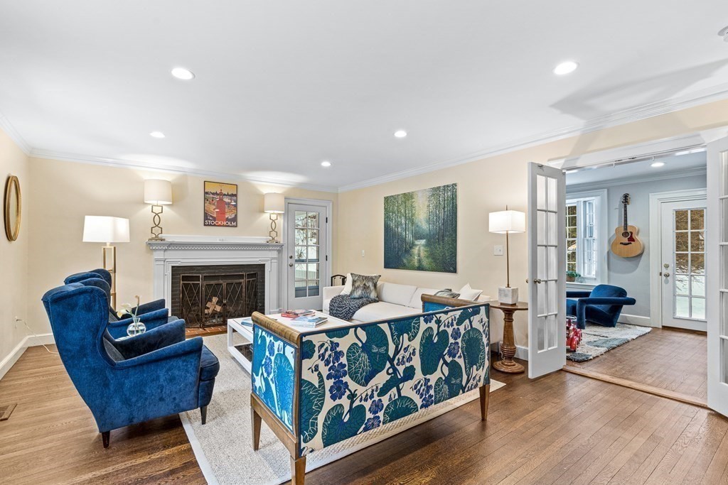 35 Sawyer Road Wellesley, MA 02481 - Photo 4 of 27 a bedroom with furniture and a fireplace