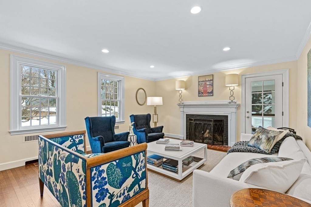 35 Sawyer Road Wellesley, MA 02481 - Photo 5 of 27 a living room with furniture a window and a fireplace