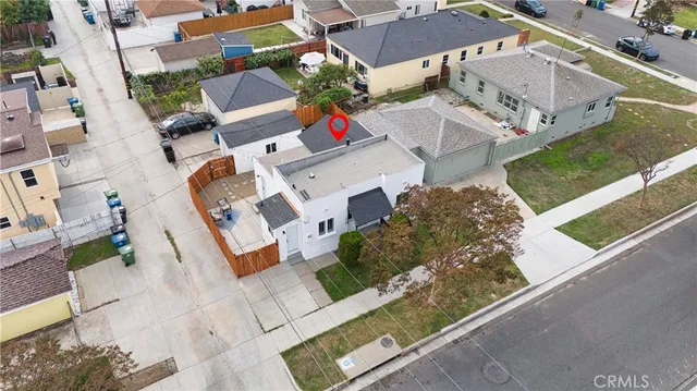 an aerial view of residential house with outdoor space
