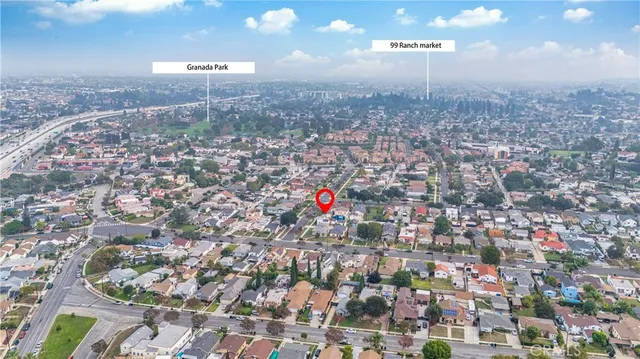 an aerial view of houses with outdoor space