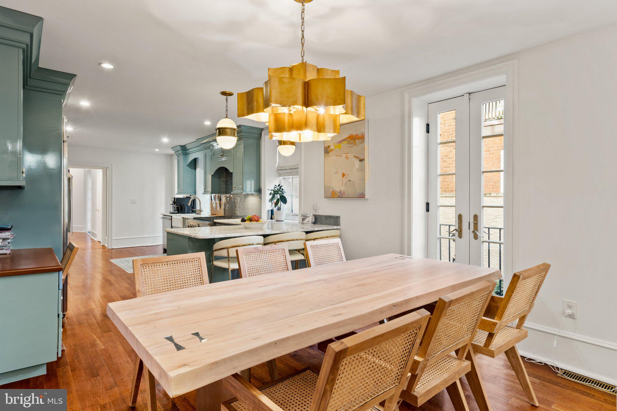 1013 Clinton Street Philadelphia, PA 19107 - Photo 14 of 53 Modern dining space with elegant lighting.