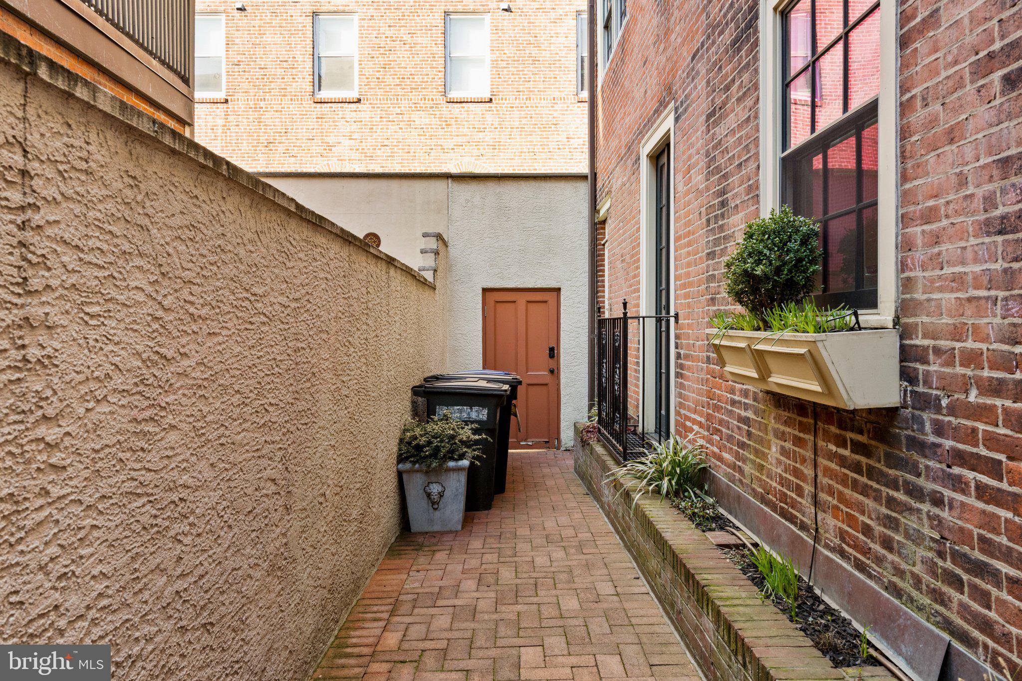 1013 Clinton Street Philadelphia, PA 19107 - Photo 16 of 53 a view of a balcony with chair and wooden floor