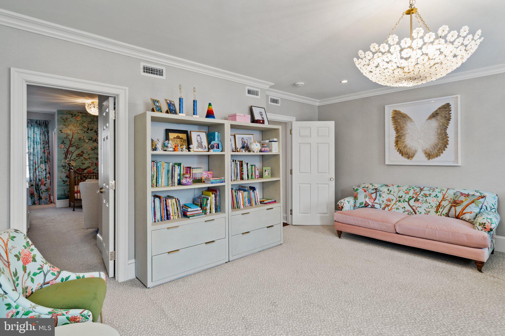 1013 Clinton Street Philadelphia, PA 19107 - Photo 41 of 53 a bedroom with furniture and a book shelf