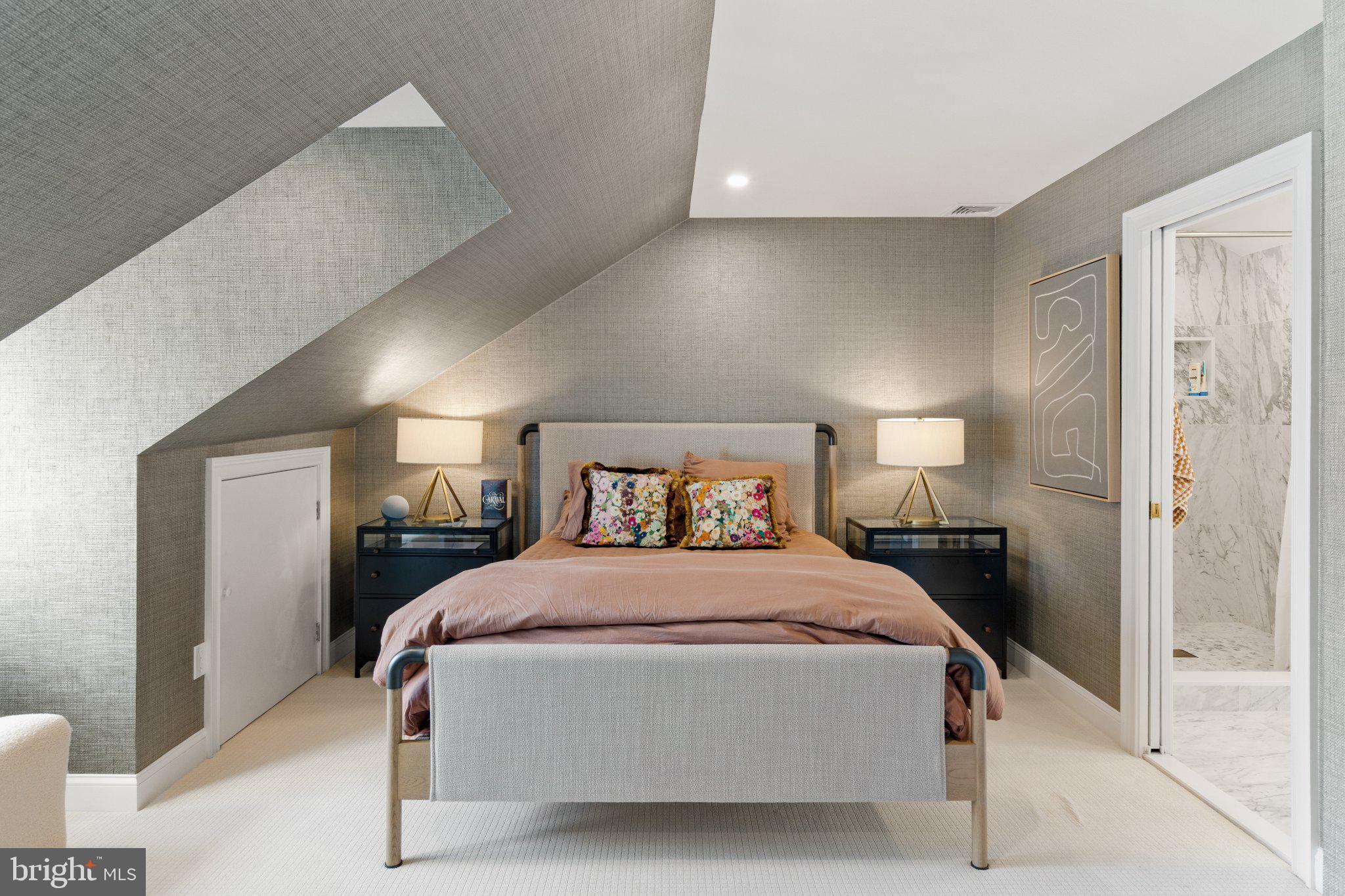 1013 Clinton Street Philadelphia, PA 19107 - Photo 45 of 53 a bedroom with a bed and a lamp