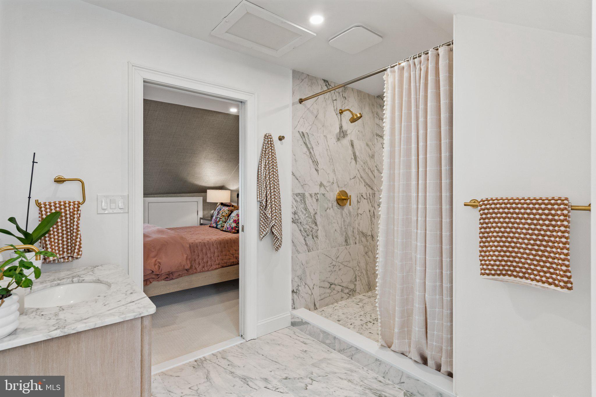 1013 Clinton Street Philadelphia, PA 19107 - Photo 48 of 53 a bedroom with a bed and a mirror