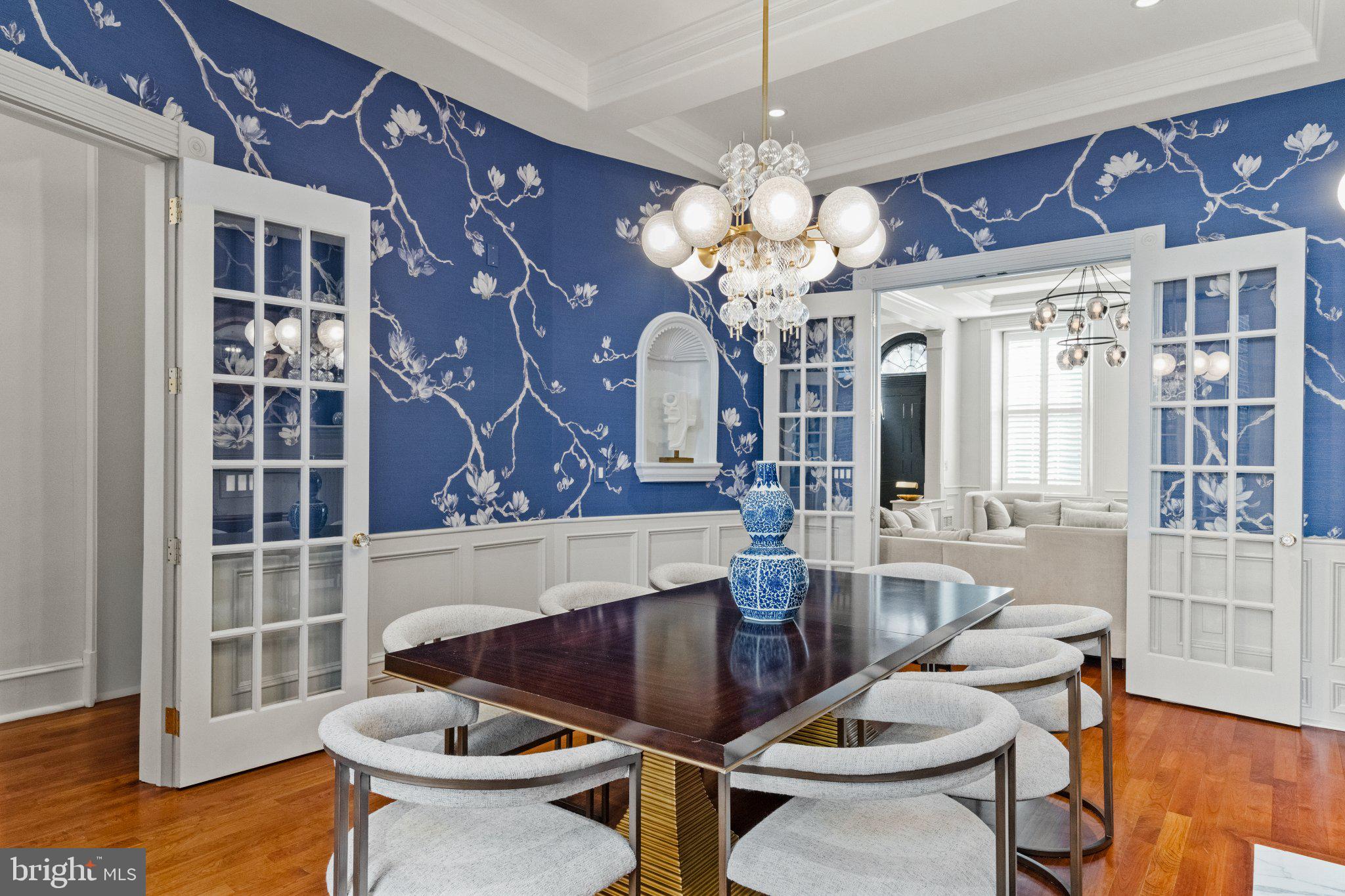 1013 Clinton Street Philadelphia, PA 19107 - Photo 8 of 53 a view of a dining room with furniture and chandelier