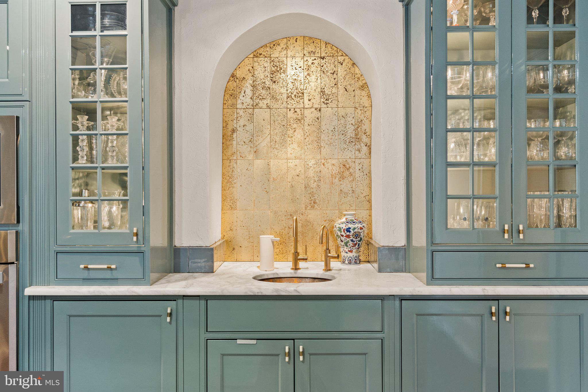 1013 Clinton Street Philadelphia, PA 19107 - Photo 10 of 53 a kitchen with a sink and natural light