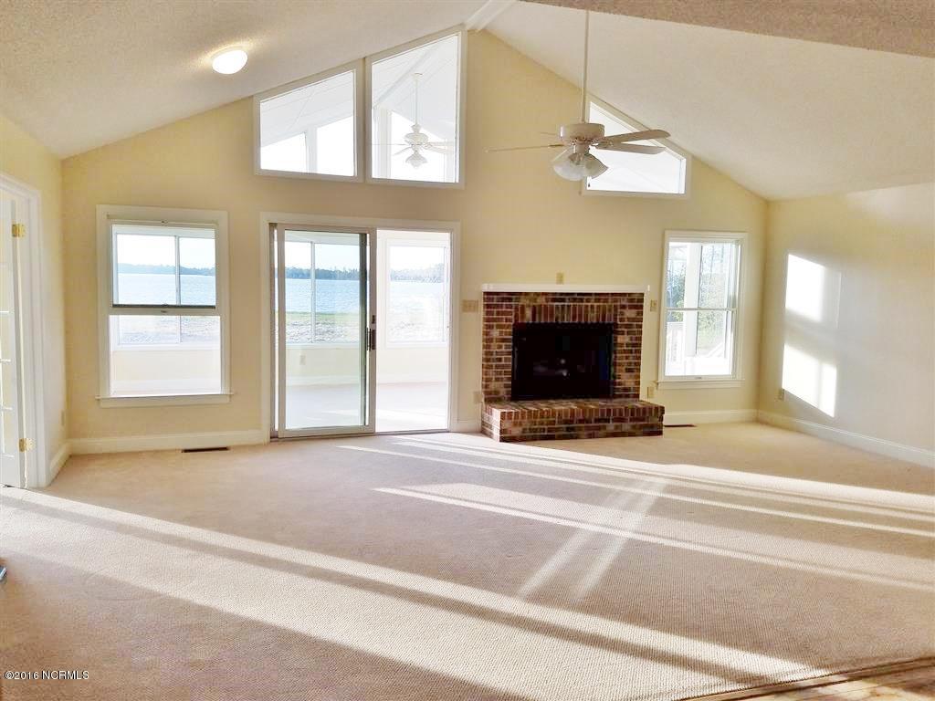 786 Weaver Camp Road Merritt, NC 28556 - Photo 13 of 26 Living Room with Vaulted Ceiling