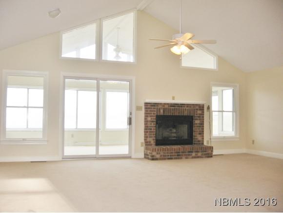 786 Weaver Camp Road Merritt, NC 28556 - Photo 7 of 26 Living Room to the Sunroom