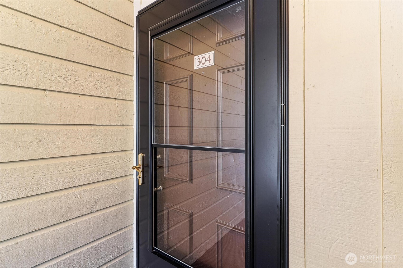 5832 Northeast 75th Street, Unit E304 Seattle, WA 98115 - Photo 2 of 36 a view of a glass door