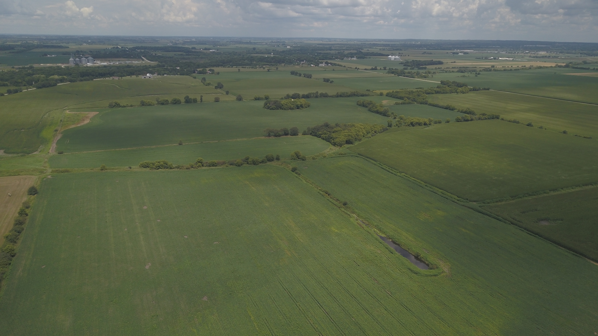24716 Streit Road Harvard, IL 60033 - Photo 3 of 9 a view of a lake view