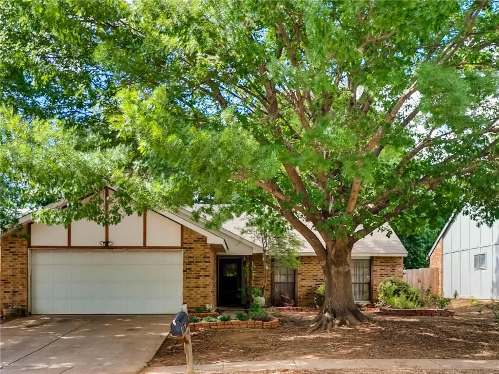 6601 Springfield Drive Arlington, TX 76016 - Photo 1 of 1 a front view of a house with a tree