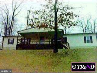 190 Webb Road Lincoln University, PA 19352 - Photo 1 of 1 a front view of a house with garden