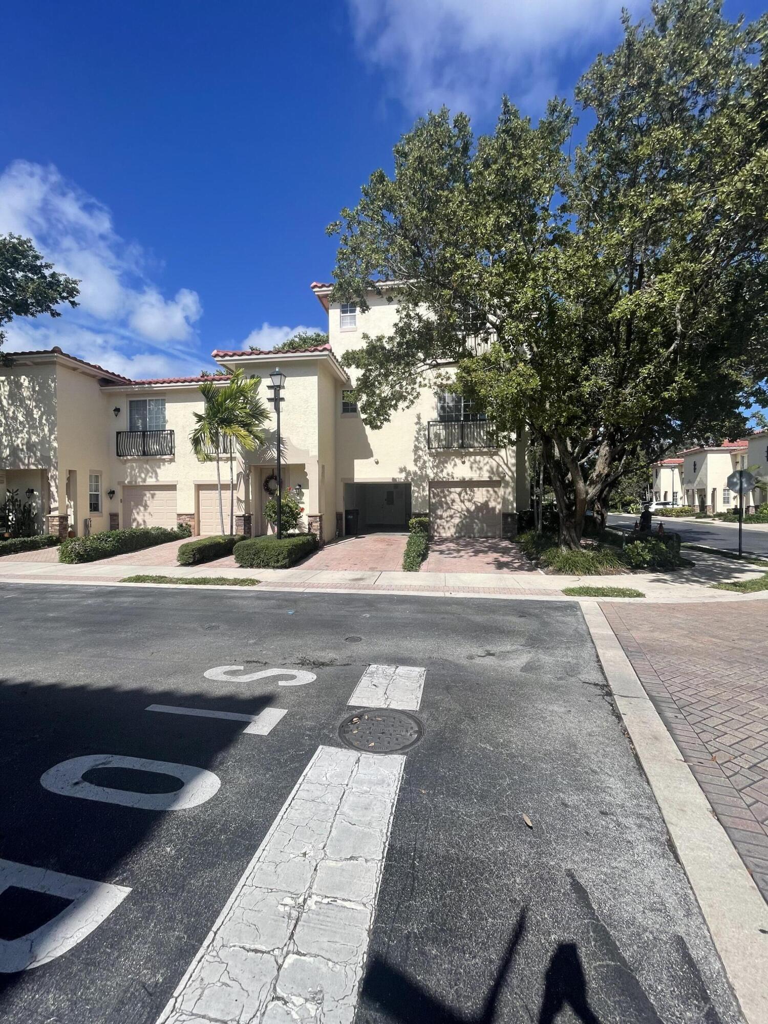 111 Stone Harbor Way, Unit F2 Delray Beach, FL 33444 - Photo 2 of 11 a view of a city street from a building