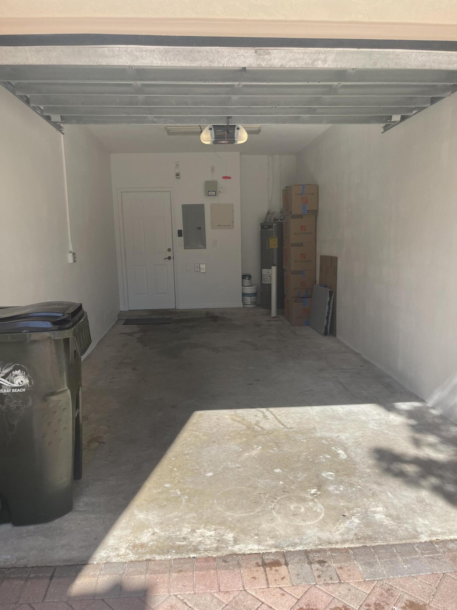 111 Stone Harbor Way, Unit F2 Delray Beach, FL 33444 - Photo 4 of 11 a view of a livingroom with wooden floor and staircase