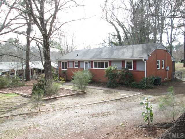 1408 Southerlund Road Garner, NC 27529 - Photo 2 of 25 Charming 3 bedroom with lots of updates! Fenced in large backyard! Lots of trees! Vinyl & aluminum over fascit soffit 2008!
