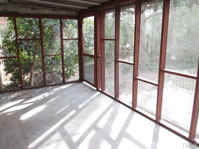 1408 Southerlund Road Garner, NC 27529 - Photo 11 of 25 Another view of wonderful screened in porch! Walk in storage off of screened porch! Could be a workshop area!
