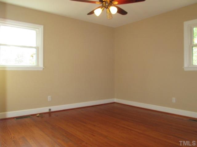 1408 Southerlund Road Garner, NC 27529 - Photo 20 of 25 All three bedrooms feature hardwood floors, ceiling fan with light kit and have just been painted!