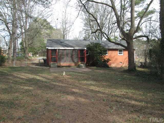 1408 Southerlund Road Garner, NC 27529 - Photo 5 of 25 Nice view of the large fenced in backyard! This fenced in yard is great for the kids or pets to run and play! Lots of trees!