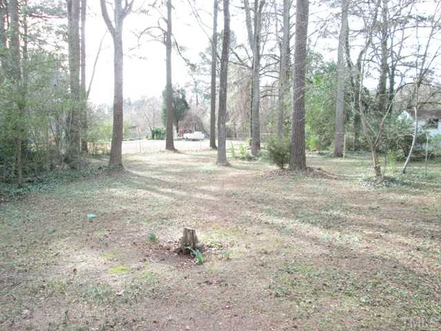 1408 Southerlund Road Garner, NC 27529 - Photo 9 of 25 Here is another view of the very large fenced in back yard! Plenty of room for the dogs or kids to run and play!
