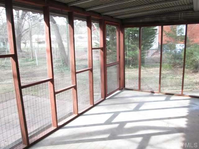 1408 Southerlund Road Garner, NC 27529 - Photo 10 of 25 Large screened porch is great for relaxing after a long day at work! This home has lots of updates and is move in ready!