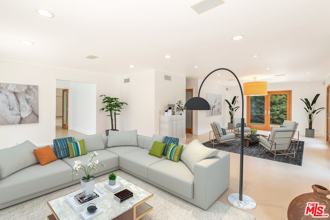 28929 Wight Road Malibu, CA 90265 - Photo 4 of 22 a living room with furniture and a large window
