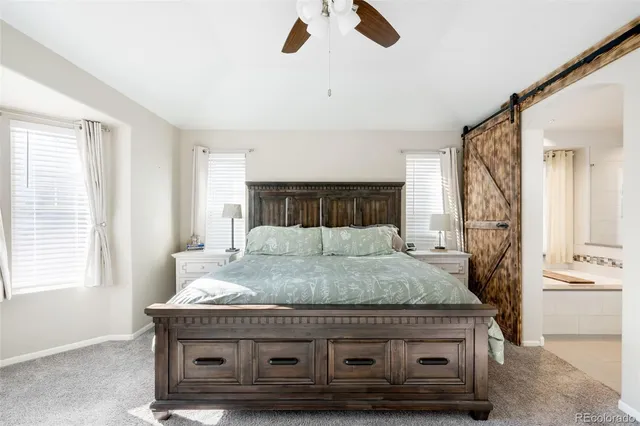 a living room with granite countertop furniture and a fireplace