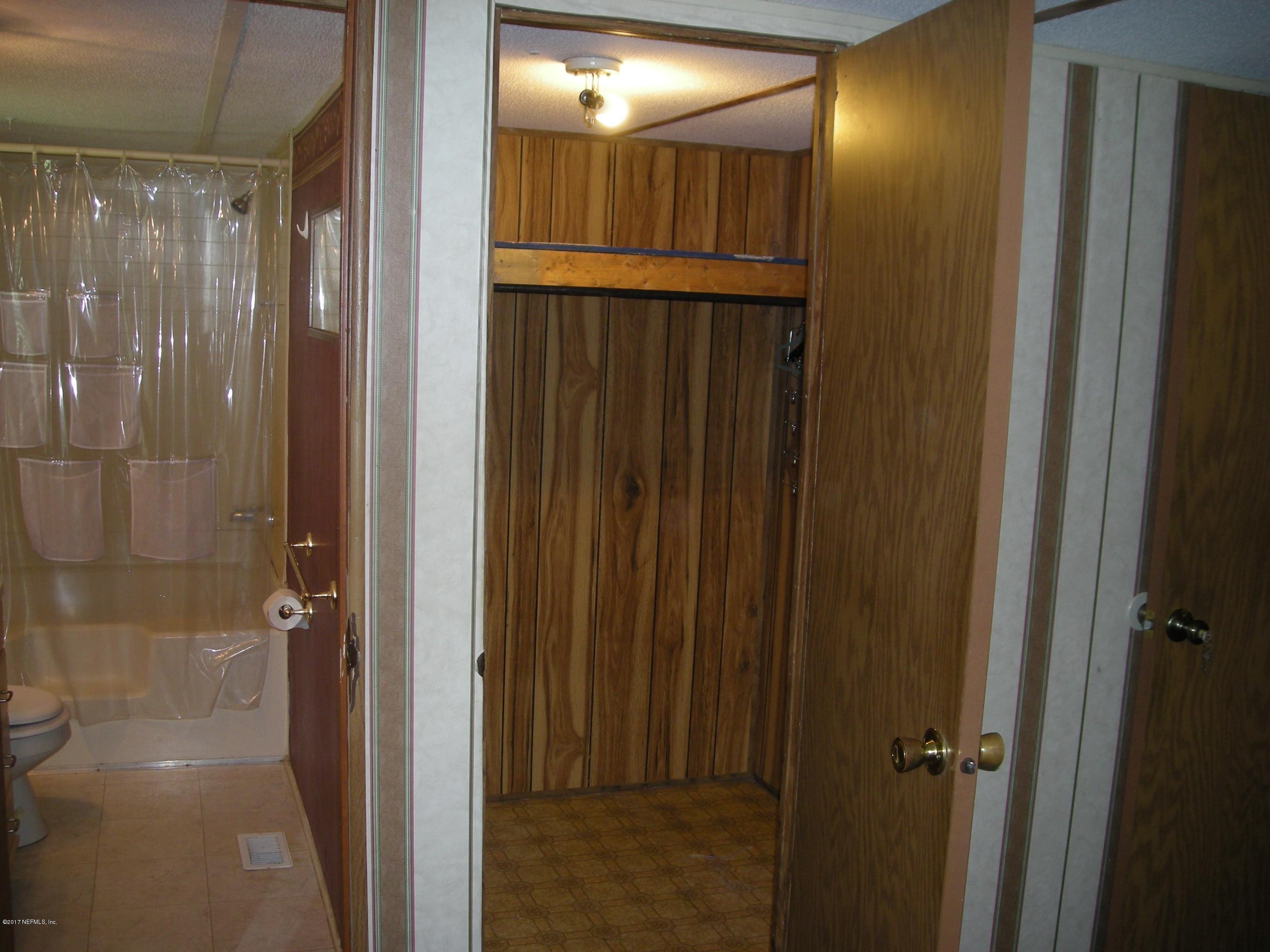 11896 Simmons Road Jacksonville, FL 32218 - Photo 12 of 18 Master walk-in