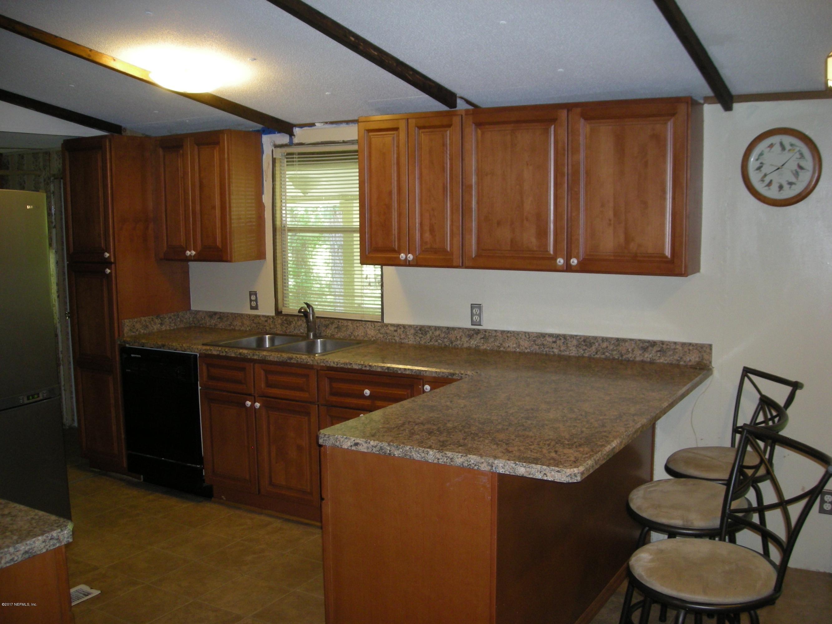 11896 Simmons Road Jacksonville, FL 32218 - Photo 8 of 18 Breakfast Bar & Stools