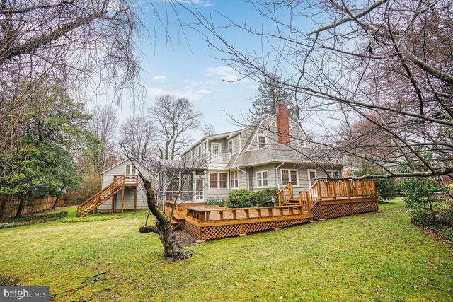 a view of a hallway with windows