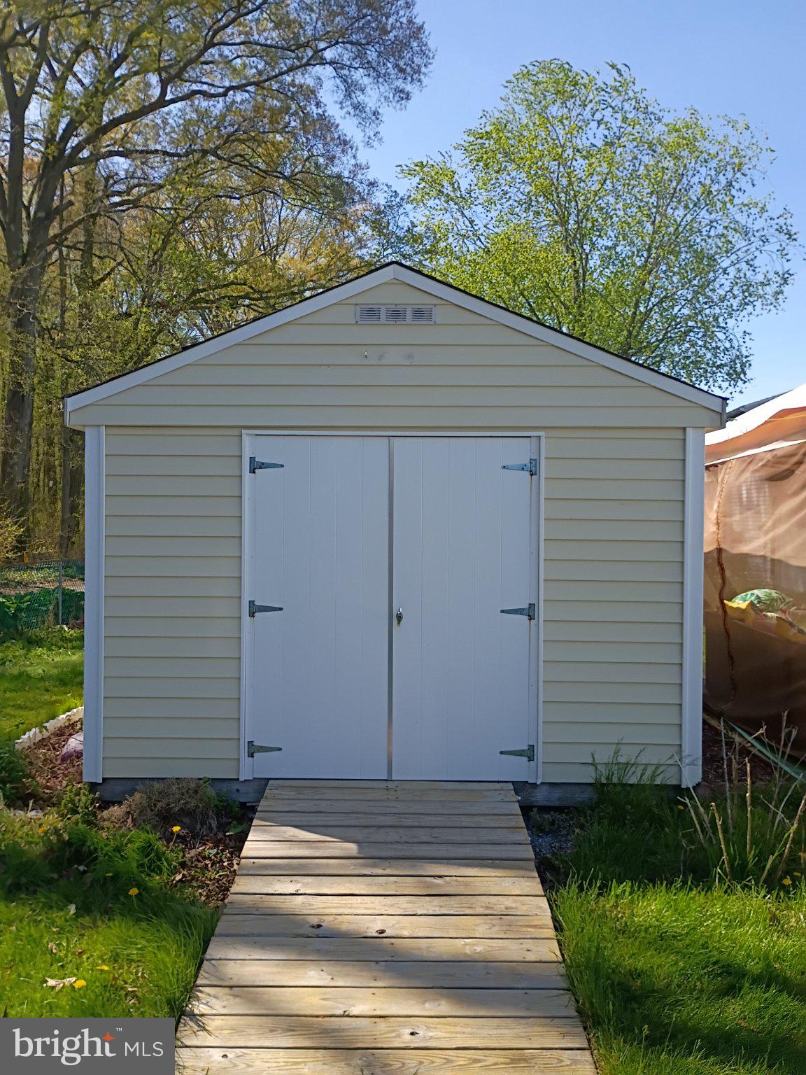 236 University Avenue Pemberton, NJ 08068 - Photo 5 of 5 Charming garden shed with a pathway.