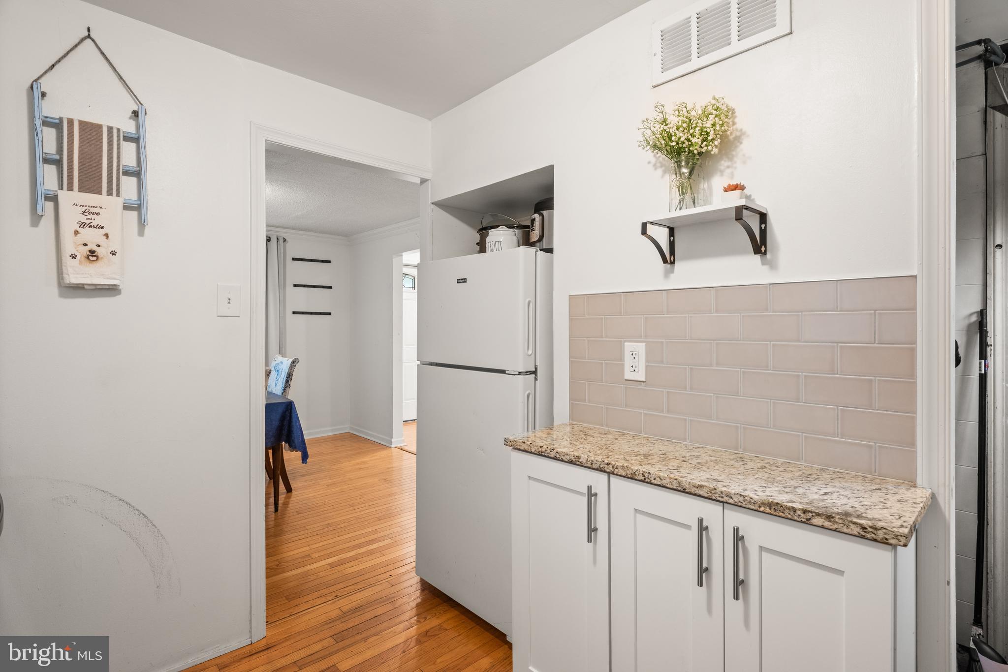 2335 Poe Road Secane, PA 19018 - Photo 9 of 15 a bathroom with a granite countertop shower a sink and a mirror