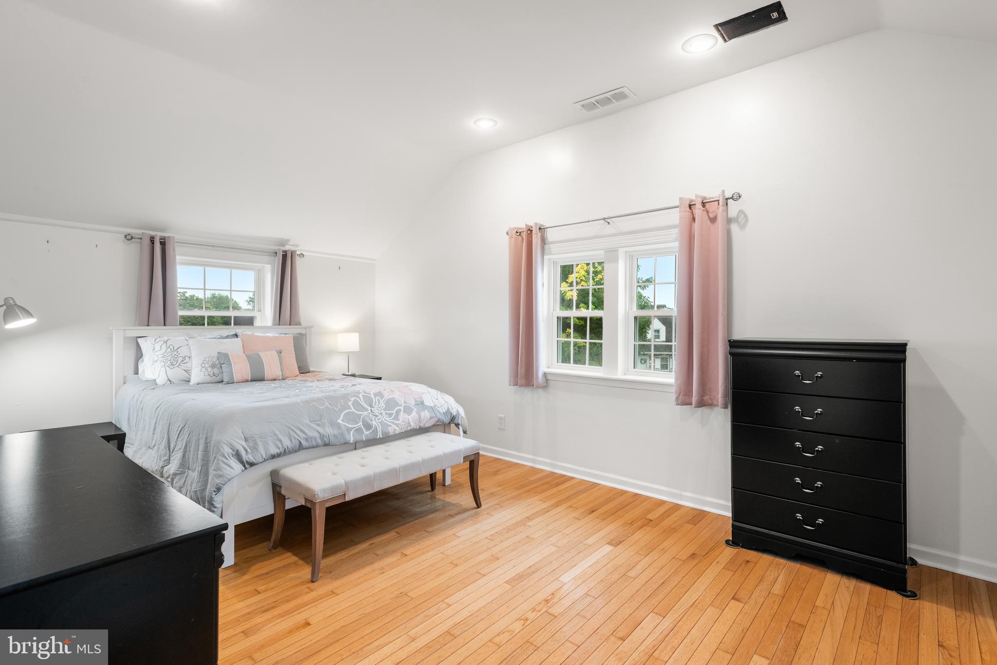 2335 Poe Road Secane, PA 19018 - Photo 10 of 15 a bedroom with a bed and a window