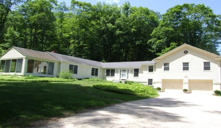 417 Salmon Kill Road Salisbury, CT 06039 - Photo 1 of 1 a front view of a house with a yard and trees