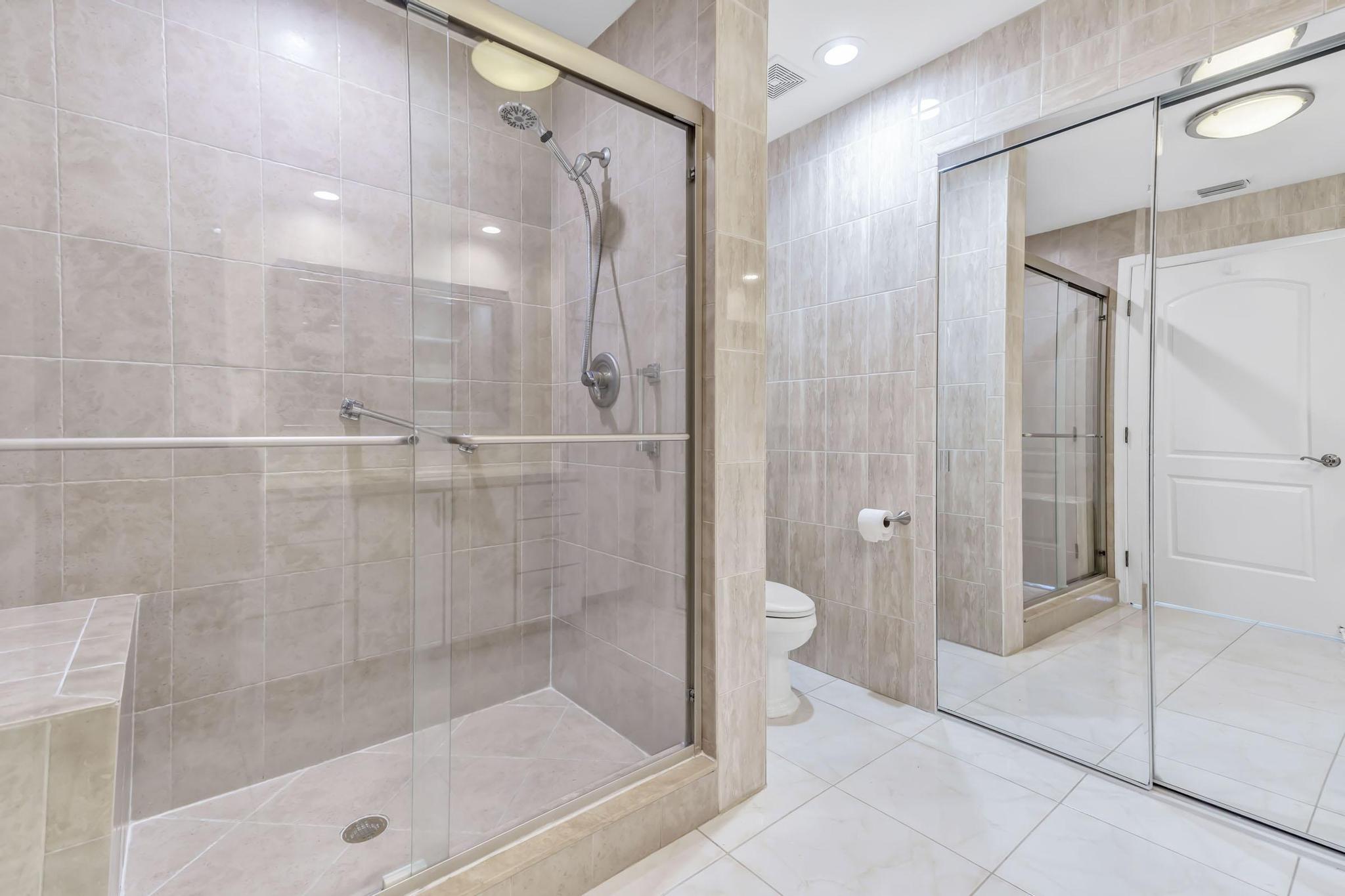 9130 Vineland Court, Unit C Boca Raton, FL 33496 - Photo 24 of 81 a bathroom with a shower and a toilet