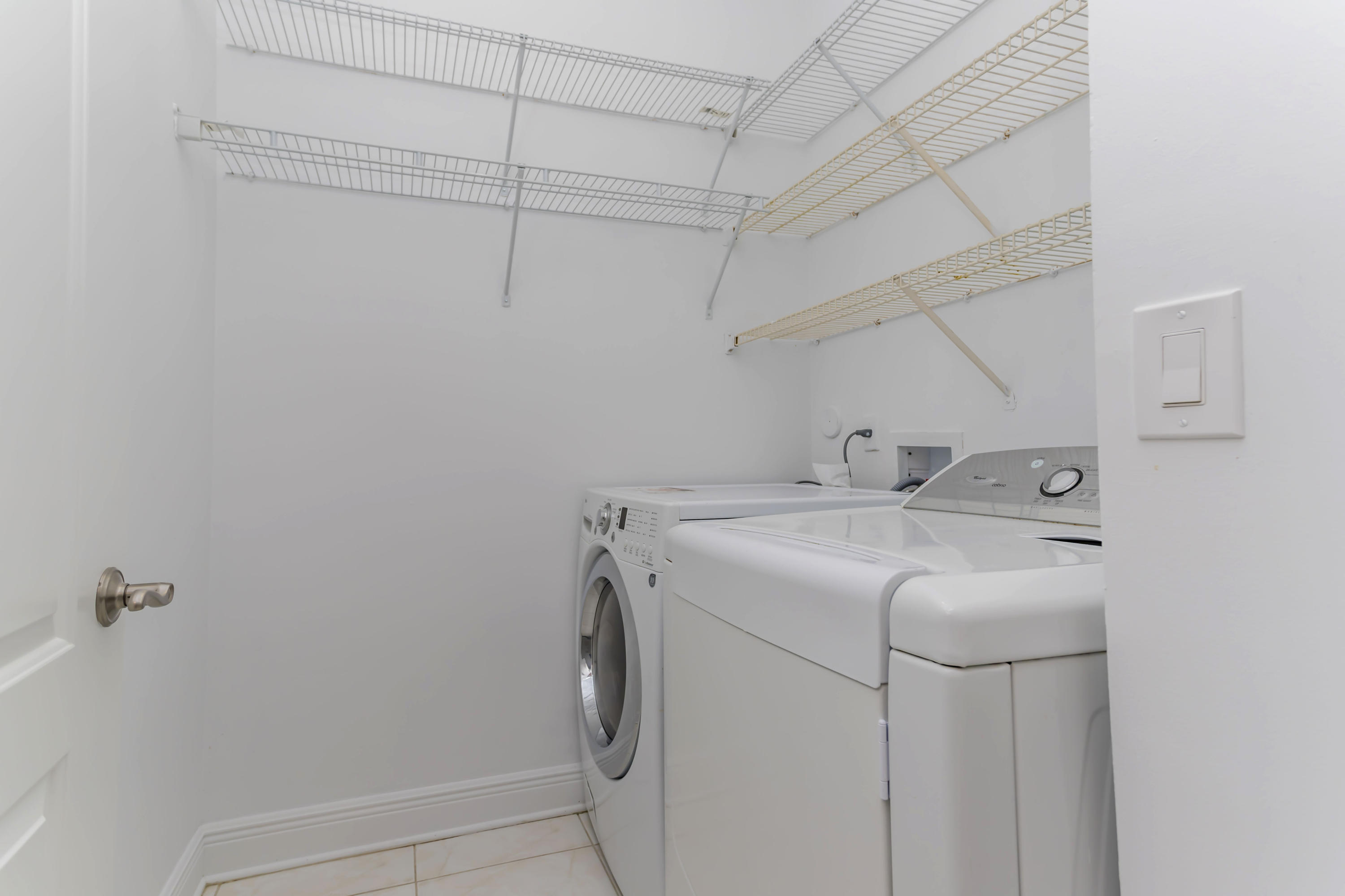 9130 Vineland Court, Unit C Boca Raton, FL 33496 - Photo 30 of 81 a utility room with dryer and washer