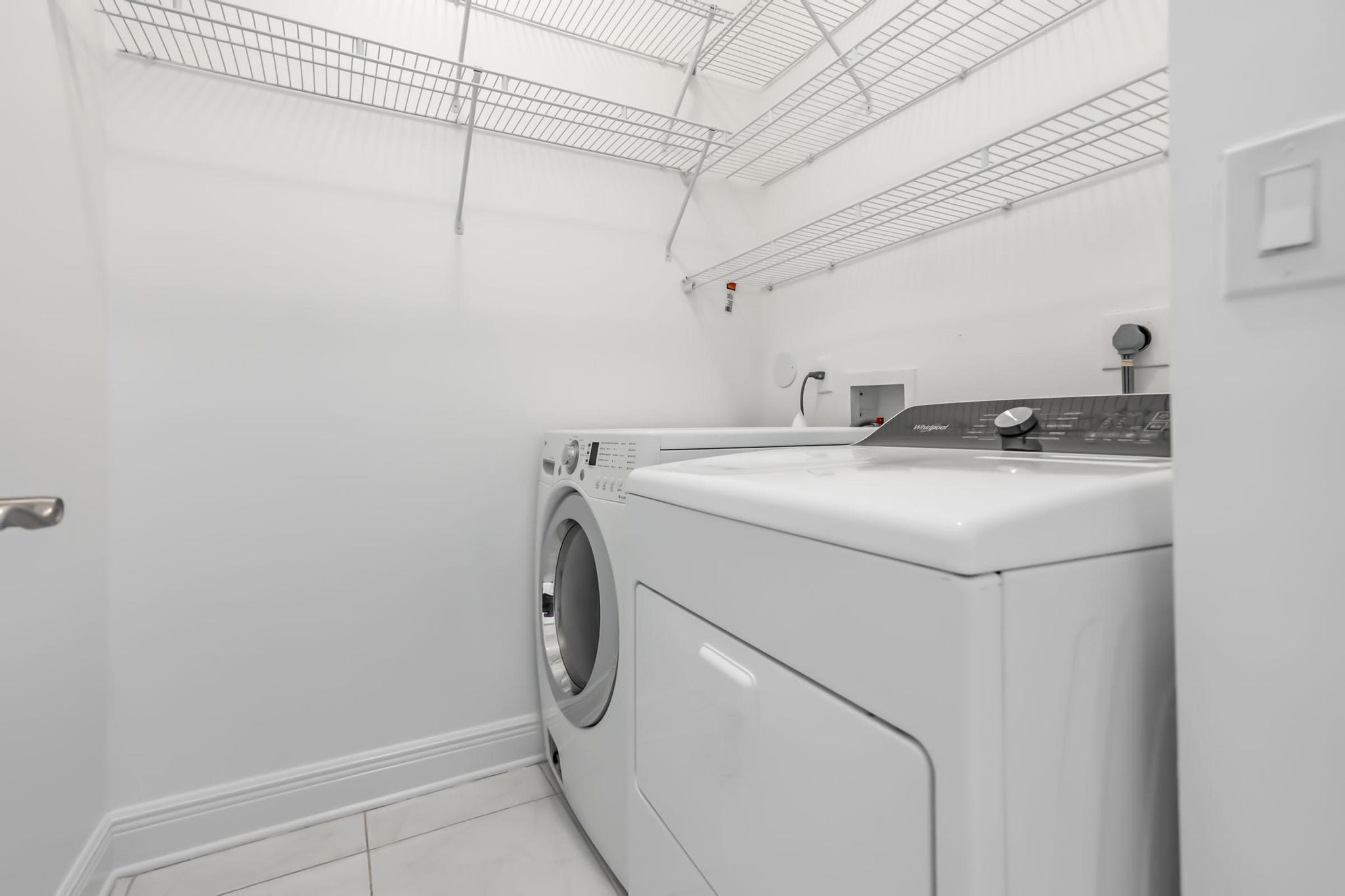9130 Vineland Court, Unit C Boca Raton, FL 33496 - Photo 42 of 81 a utility room with dryer and washer