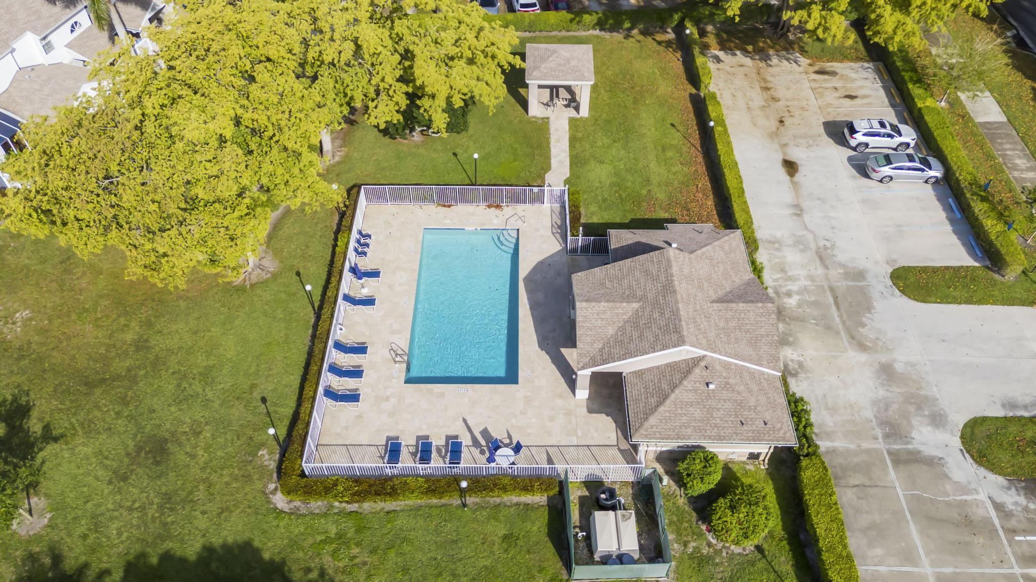 9130 Vineland Court, Unit C Boca Raton, FL 33496 - Photo 70 of 81 an aerial view of a house with a yard