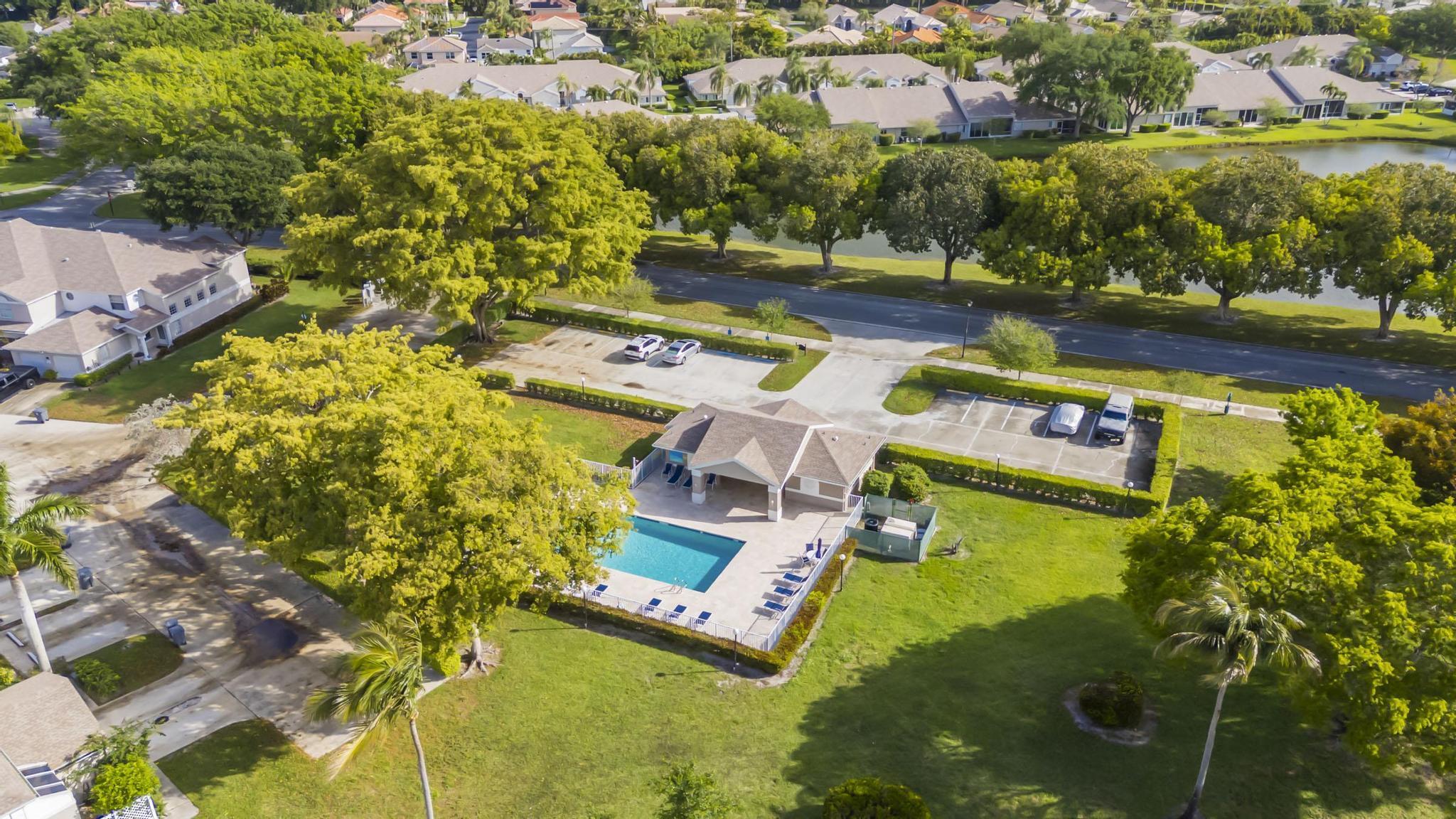 9130 Vineland Court, Unit C Boca Raton, FL 33496 - Photo 71 of 81 an aerial view of residential house with outdoor space and swimming pool