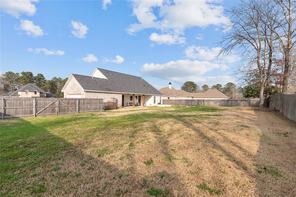 550 Ramsey Road Stonewall, LA 71078 - Photo 40 of 40 a view of a house with a yard