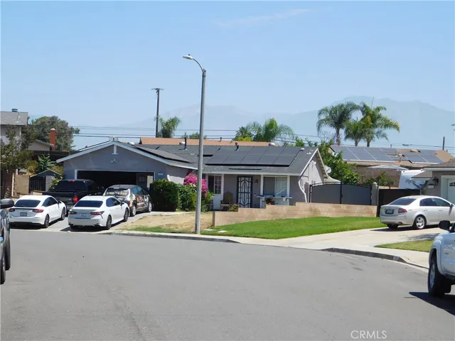 a car parked in front of a house