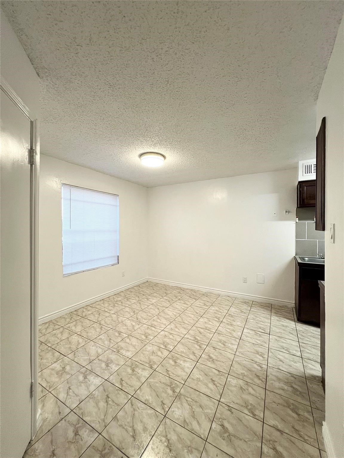12710 Leader Street, Unit B Houston, TX 77072 - Photo 8 of 10 a view of an empty room