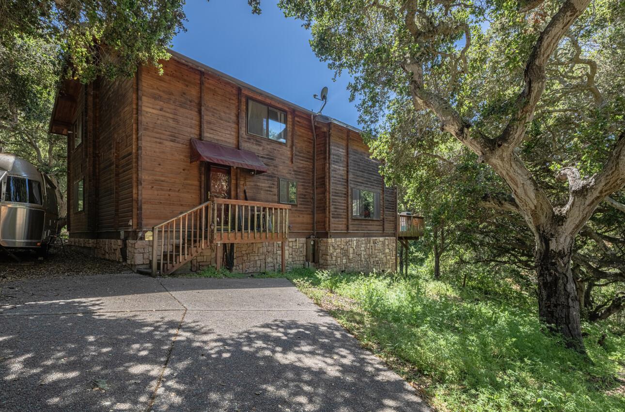 11521 Hidden Hills Road Carmel Valley, CA 93924 - Photo 4 of 26 a view of a house with a yard