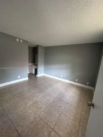 an empty room with a workbench