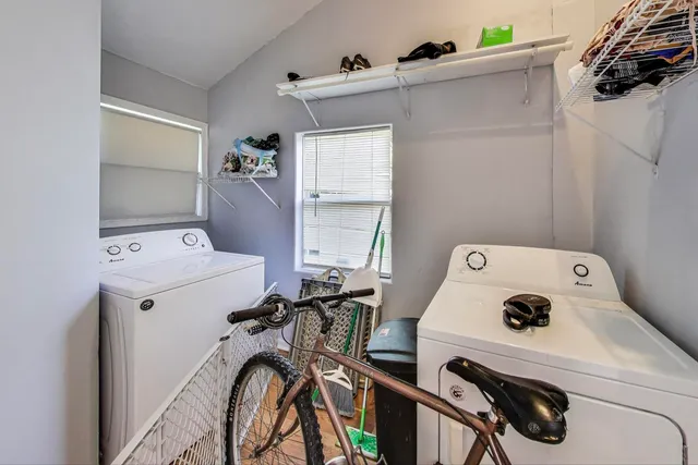 a utility room with dryer and washer