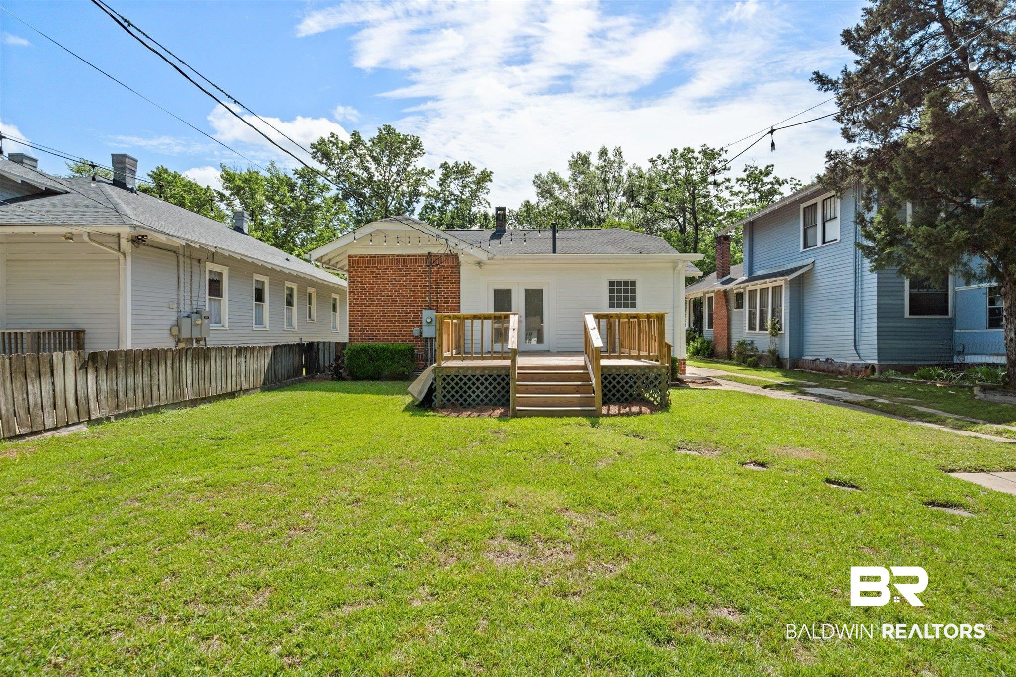 24 Macy Place Mobile, AL 36604 - Photo 30 of 38 Rear view of property with a wooden deck