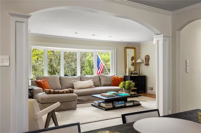 a kitchen with stainless steel appliances granite countertop a sink and a stove