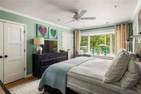 an empty room with a empty space and windows